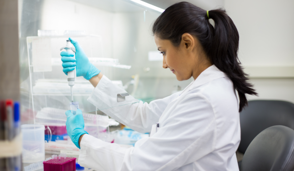 NGS omics sequencing services image of a female scientist in a laboratory